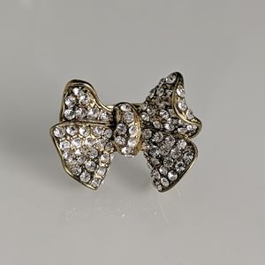 Crystal embedded bow plated gold ring
